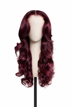 Load image into Gallery viewer, Burgundy red wine lace front wig on beige mannequin head, long wavy human hair wig photographed on clean white studio background